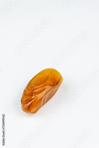 Close-up of dates against a white background. Ramadan concept.