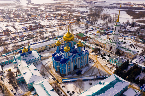 Winter view from a drone of the Nativity-Bogoroditsky monastery in the center of the city of Zadonsk surrounded ..by residential buildings, Russia
