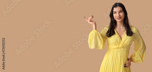 Beautiful young woman in st...