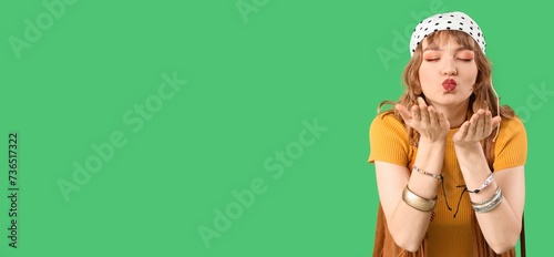Female hippie blowing kiss ...