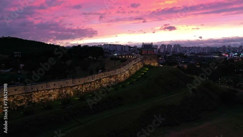 Drone view, Hwaseong Fortress during dusk and sunset sky, South Korea photo