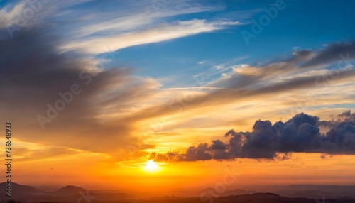 eal dramatic sunrise against a sky with colorful clouds amazing sunset sundown without any birds large panoramic