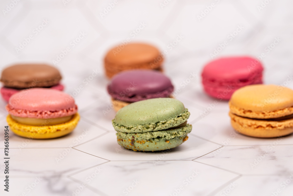 Fototapeta premium Bakery Still Life,Pastel Macarons,macarons arranged on background,food background. 