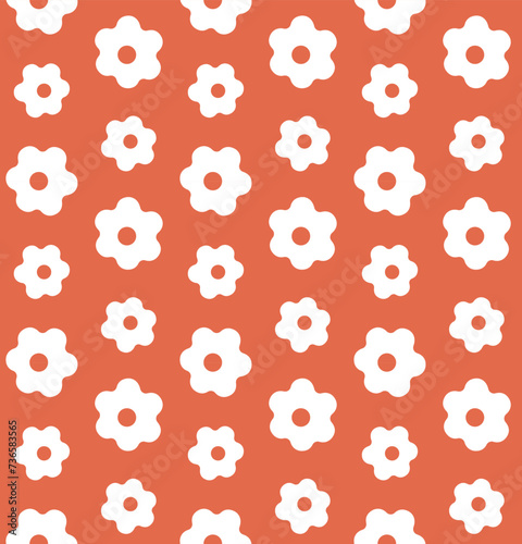 Vector seamless pattern of groovy flowers isolated on orange background