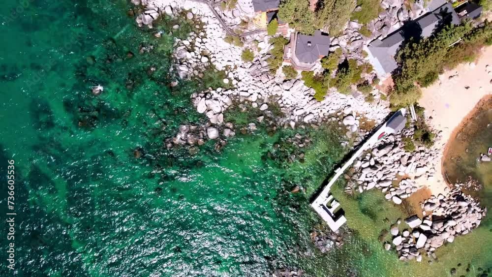 Aerial Top Panning Beautiful View Of Resorts At Beach, Drone Flying Over Wavy Lake On Sunny Day - Tahoe City, California Aerial Top Panning Beautiful View Of Resorts At Beach, Drone Flying Over Wavy Lake On Sunny Day - Tahoe City, California