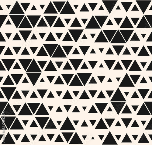 Black and white vector seamless pattern with small triangles. Stylish modern background with halftone effect, randomly scattered shapes, diamonds. Simple monochrome texture. Trendy repeated geo design