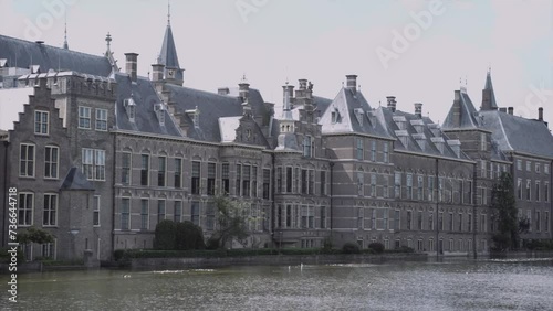 Panning Shot Of Binnenhof Castle And Hofvijver Lake