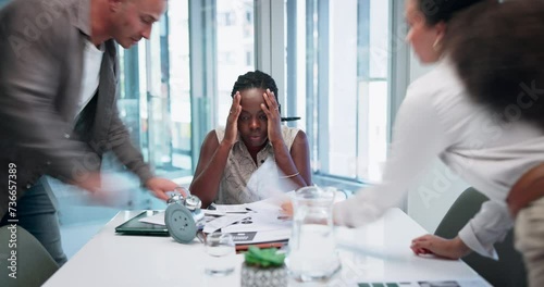 Overwhelmed businesswoman with headache, burnout or stress with crisis, fatigue or depression in office. Time lapse, blurry or employee with anxiety and frustrated by migraine pain, risk or mistake photo