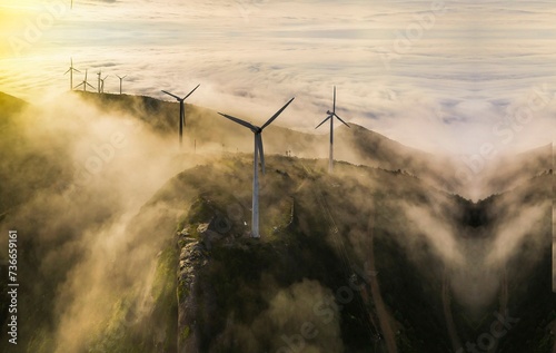 Windmill in the field, windmill with solar plants, renewable resources for the environment