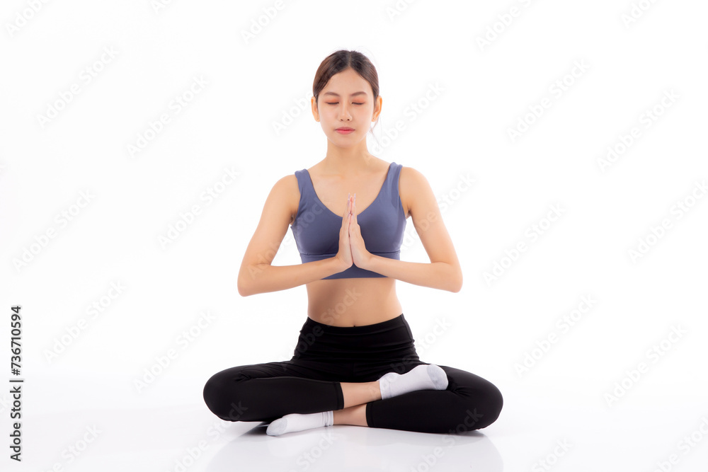 Portrait young asian woman wearing sportswear meditates while practicing yoga, promoting tranquility and wellness isolated white background, woman practicing yoga in peaceful for relax, sport concept.