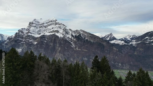 Fronalpstock Glarus Switzerland slow reveal of village in the valley photo