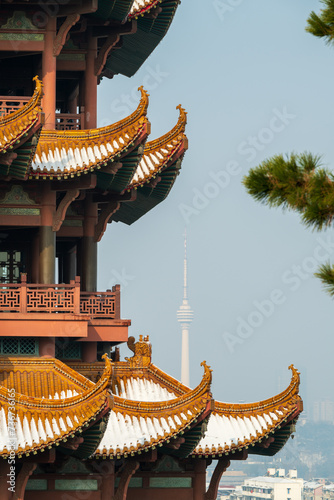 Yellow Crane Tower and Guishan TV Tower are in the same frame.