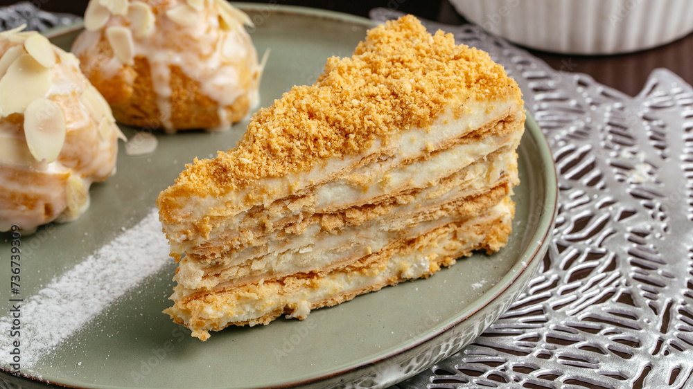 sponge cake dessert on a plate in a coffee shop on the table