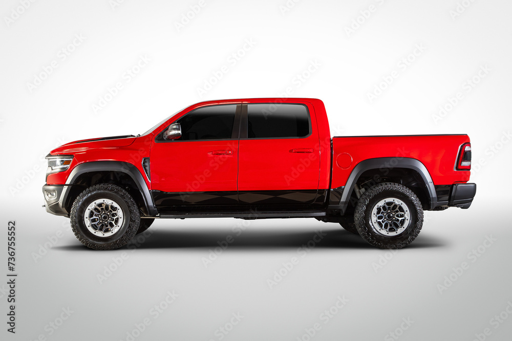 Side view of red powerful pickup truck on white background
