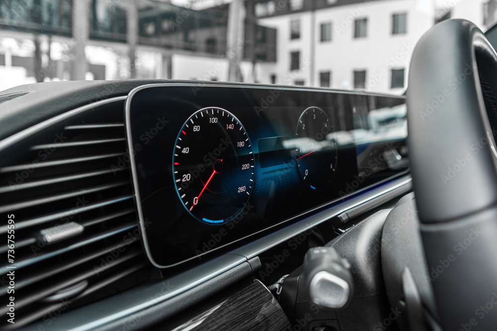 Close-up shot of a car's digital speedometer.Modern light car mileage (dashboard, milage). New display of a modern car.