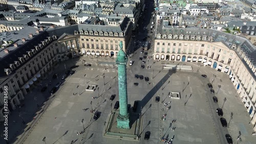 Bronze column in Place Vendome, Paris in France. Aerial drone orbiting photo
