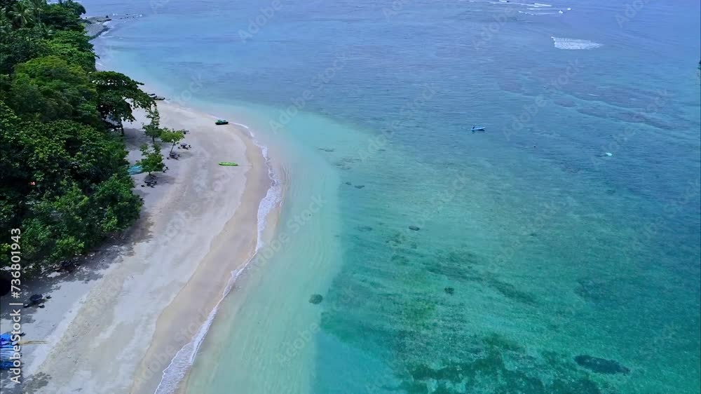 Aerial View of Beautiful Turquoise Water Sea at Senggigi Beach, Lombok Indonesia Aerial View of Beautiful Turquoise Water Sea at Senggigi Beach, Lombok Indonesia