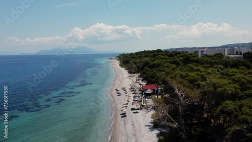 Aerial view of sandy white beach and turquoise sea in a tourist resort in Xylokastro, Greece photo