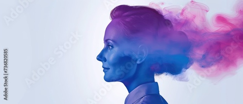 a woman with blue and pink smoke coming out of her head and her hair in the shape of a woman's head. photo