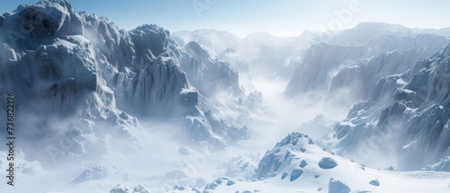 a group of mountains covered in snow with a blue sky in the middle of the picture and clouds in the middle of the picture.