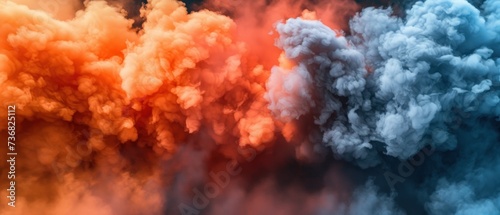 a group of smoke billowing out of the top of a cloud of blue  orange  and red smoke.