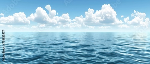 a large body of water with some clouds in the sky and a blue sky with white clouds in the background.