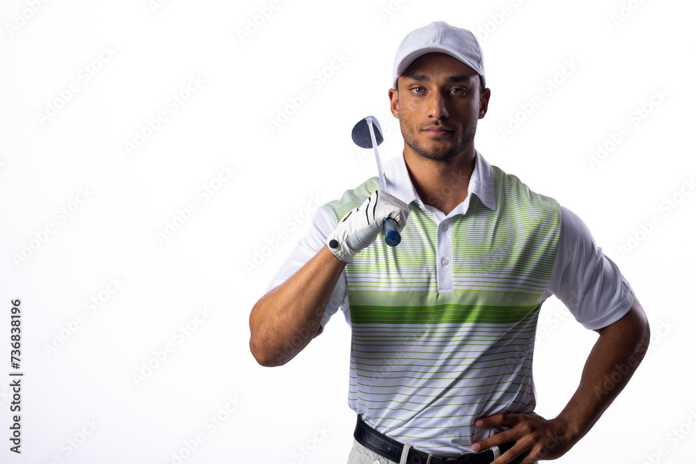 Confident golfer posing with a club, with copy space Confident golfer posing with a club, with copy space