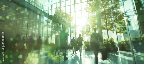 Corporate, building and business group of people walking for city exploration, sustainable living or office. Blurry, silhouette and movement background for architecture, wallpaper and eco friendly photo