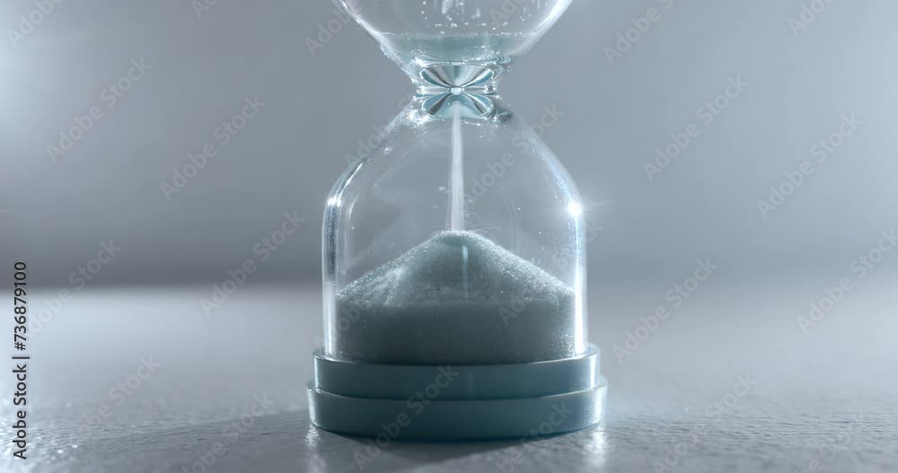 Close-up of sand hourglasses captures time's fleeting nature Sand hourglasses remind importance of time planning ancient timekeeping methods. Sand hourglasses signifies change urging new beginnings.