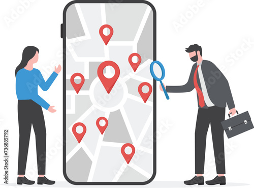 Businessman searching for location on mobile phone map.

