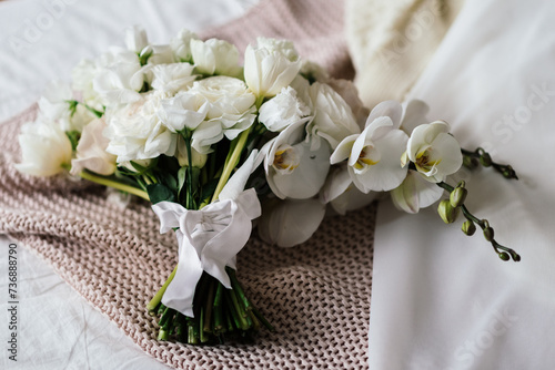 delicate wedding bouquet of white orchids. tenderness and beauty