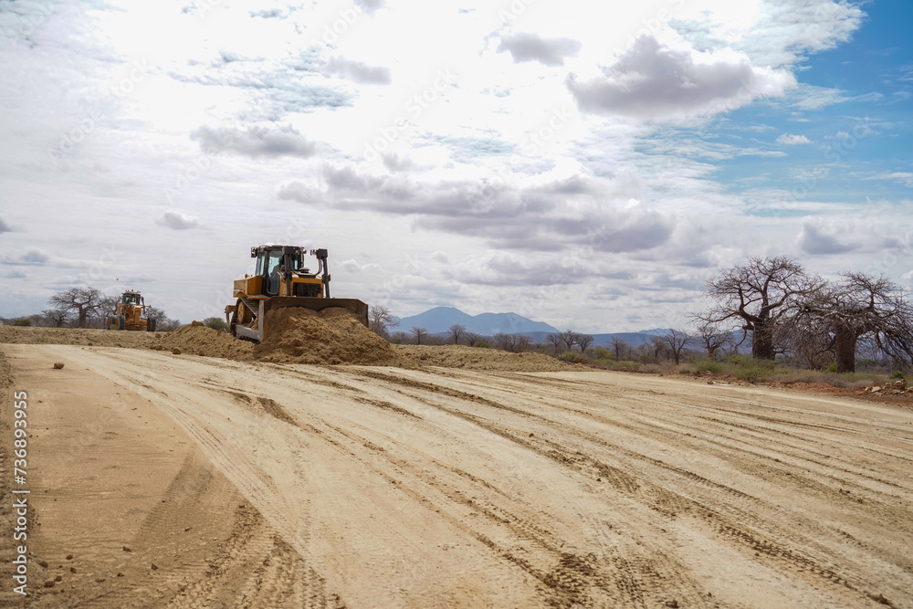 Fototapeta premium construction machines at works, GPS grader