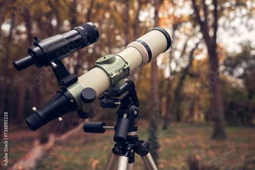 Telescope for bird and animal observing in nature. photo
