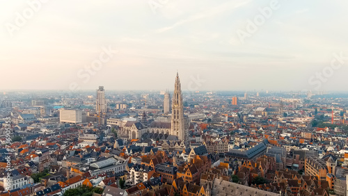 Antwerp, Belgium. Panorama overlooking the Cathedral of Our Lady (Antwerp). Historical center of Antwerp. City is located on the river Scheldt (Escaut). Summer morning, Aerial View photo