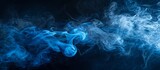 An artistic closeup of electric blue smoke resembling a geological phenomenon on a black background, creating a mesmerizing pattern in space