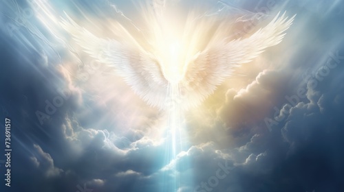 Angel wings in the sky with sun rays photo