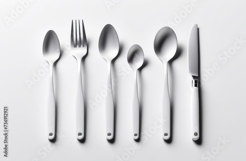 Cutlery set with fork  knife  spoon  cutlery isolated on white background. Flat lay  top view  copy space. Silverware set. Above view.