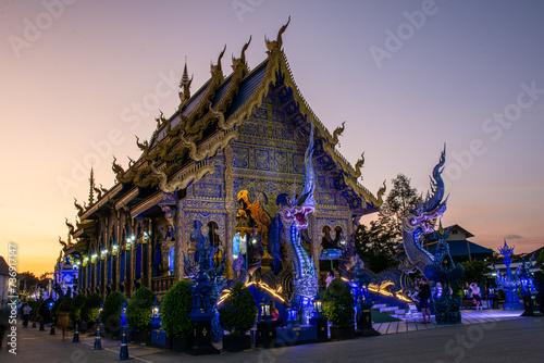 Wat Rong Sua Ten temple at sunset twillight, Chiang Rai Province, Thailand photo