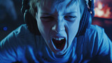 rage quit, child gambles online, plays online games, with headphones and microphone, hatred and agitation and insults on the internet, online gamer, young boy