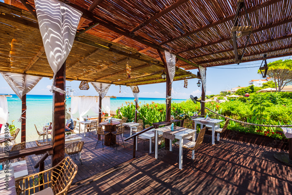 Paradise restaurant on tropical seashore. Zakhyntos, Greece.