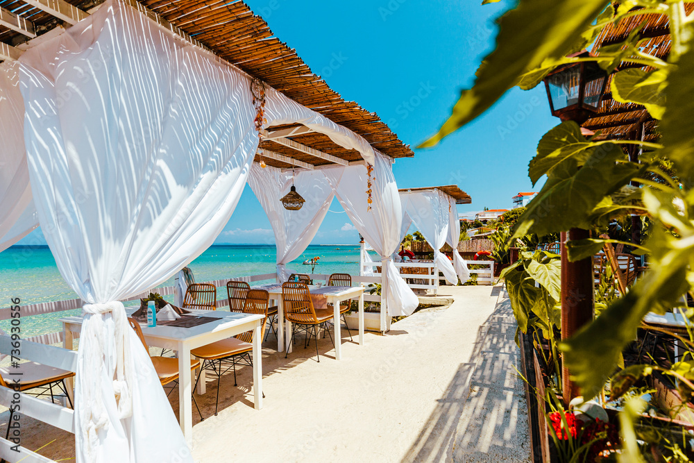 Paradise restaurant on tropical seashore. Zakhyntos, Greece.