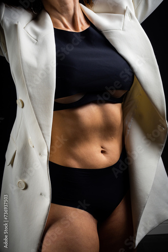 A business woman showing off her body in her underwear. © Evgeny Leontiev