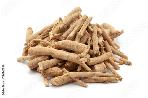 Close-up of Dry Organic Ashwagandha (Withania somnifera) roots, isolated on a white background. Front view