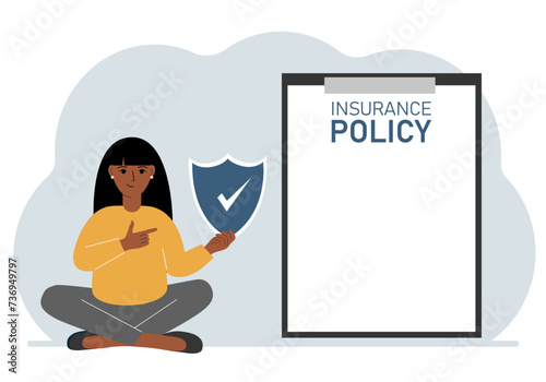 A woman holds an insurance policy sign in his hands. The concept of life insurance, property or natural disasters.