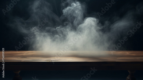 Empty wooden table with smoke float up on dark background