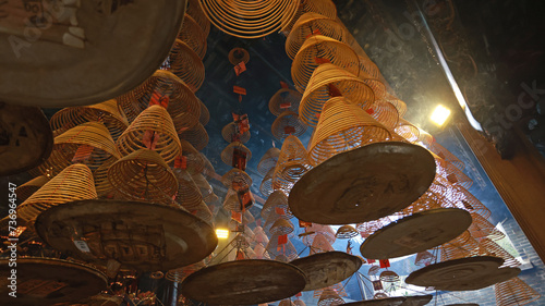 large amount of incense coils at the top of hong kong Chinese taoist temple  photo