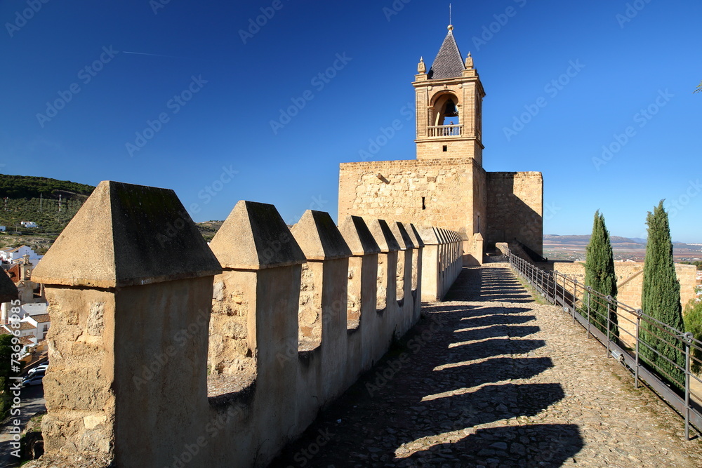 The ramparts of Alcazaba fortress in Antequera, Malaga province, Andalusia, Spain, with the tower of Homenaje in the background