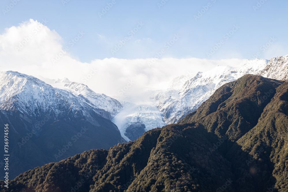 aerial view of franz josef glacier with clouds. New Zealand