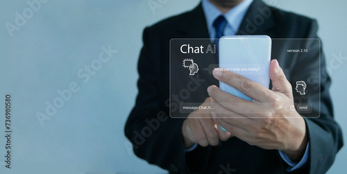 Chat ai concept. Businessman chats with AI on a smartphone. Chatting with a smart artificial intelligence, a customer chatbot service application, using command prompt to generate outputs. photo