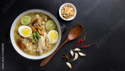 soto ayam, a typical Indonesian food soup isolated on empty space  photo